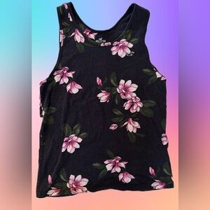 Hollister Floral Tank Top 
Navy Blue w/ Pink Flowers 
Fantastic
Size x- small